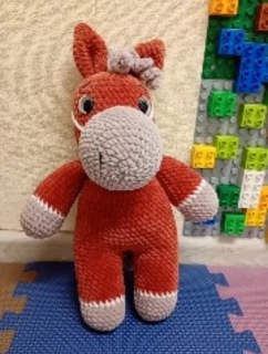 Háčkovaný koník